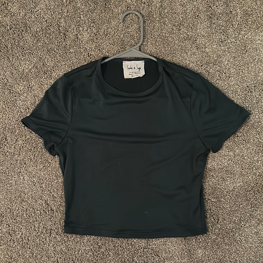 NWOT bought from dry goods, brand is sadie & sage. plain teal shirt size small